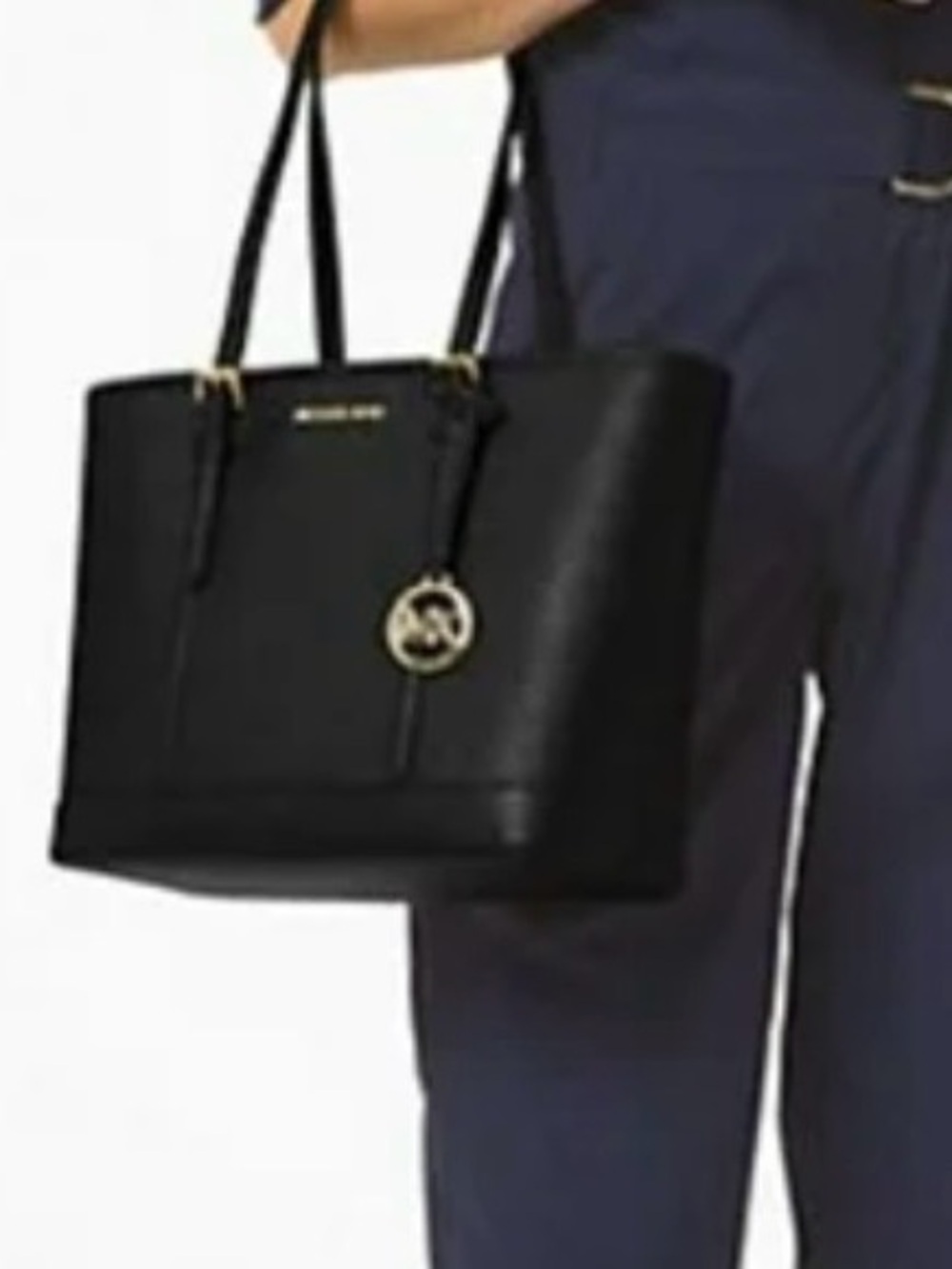 Michael Kors Jet Set Travel Tote bag in black.